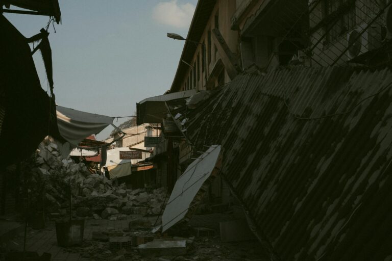 Destruction in Antakya, Türkiye, shows collapsed buildings and debris.