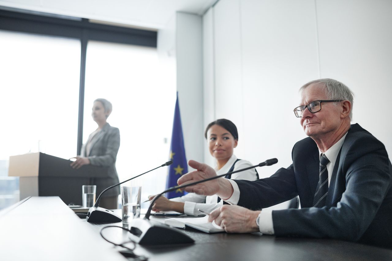 EU diplomatic conference with microphones