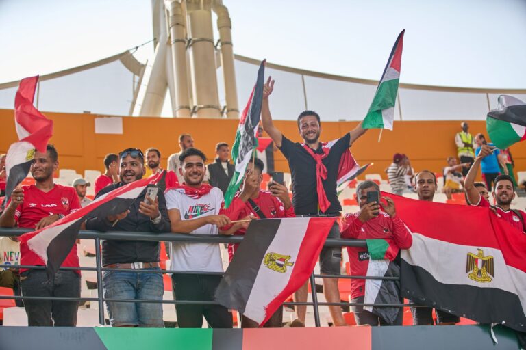Football fans cheering at stadium